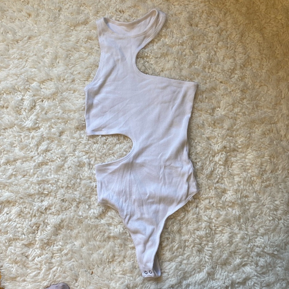 Asymmetrical white rib knit bodysuit with side cutout